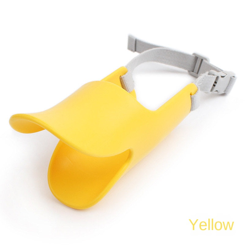 Small yellow dog muzzle with adjustable strap for comfort