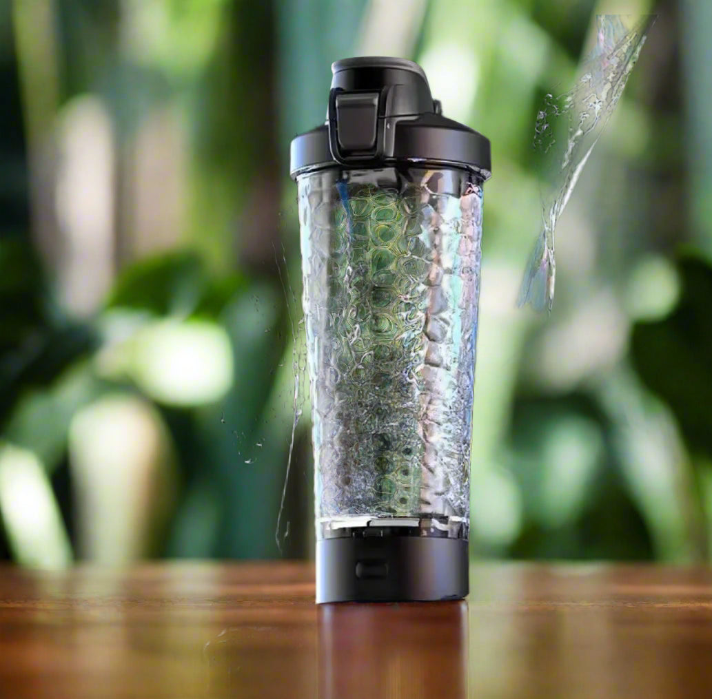 Black 650 ml electric protein shaker with a visible vortex for smooth shakes.
