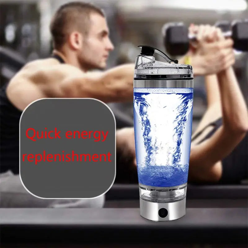 A man using electric protein shaker bottle at the gym
