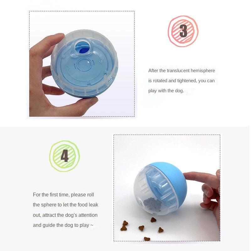 Hand holding blue interactive feeder ball with treats inside
