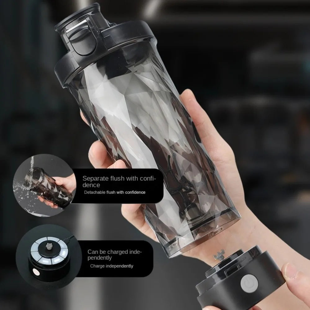 Black portable protein shaker bottle pouring water into cup