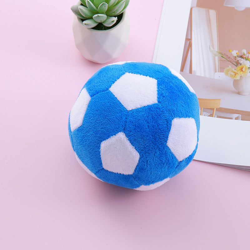 Close-up of blue soccer-style simulation dog toy