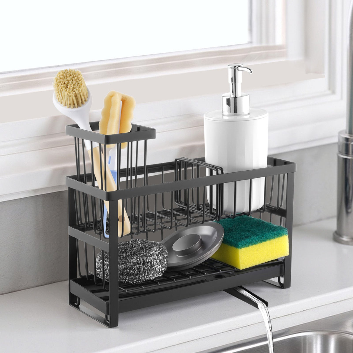 Sink caddy on a windowsill with a soap dispenser and brushes