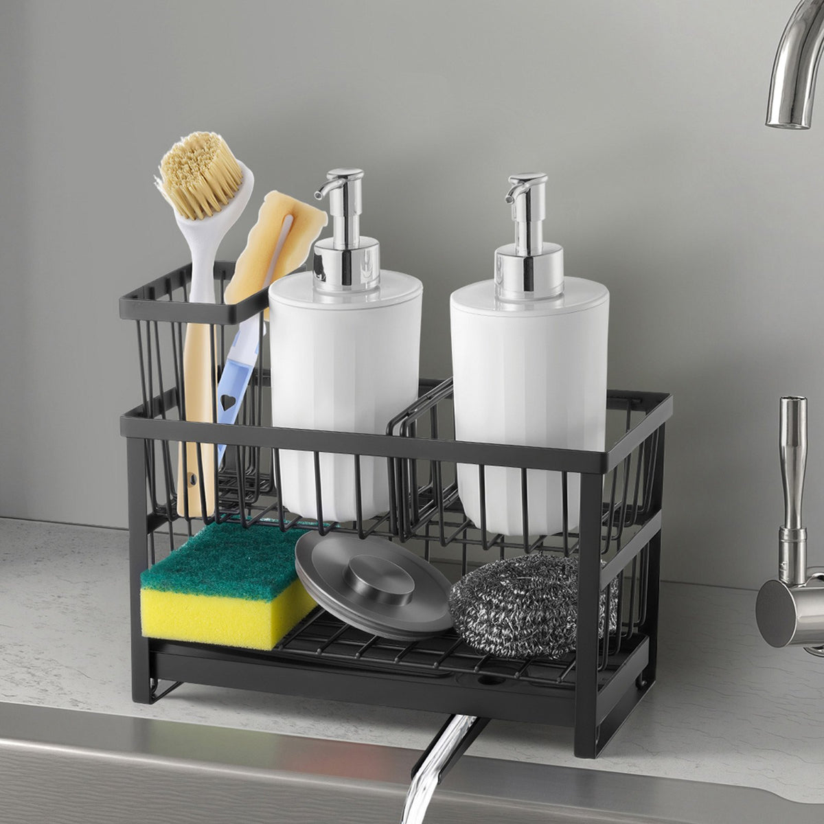 Black metal sink caddy holding two soap dispensers, brushes and a sponge