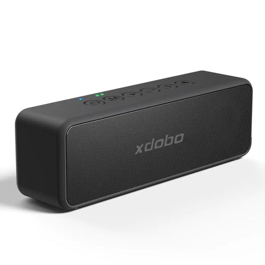 A black rectangular Bluetooth speaker with rounded edges showing the Xdobo branding. The speaker has control buttons on top and a mesh speaker grille on the front.