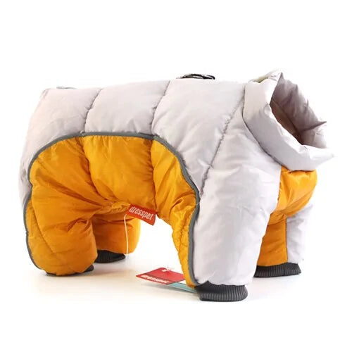 A quilted dog winter coat in white and golden yellow with ribbed cuffs and padded construction 
