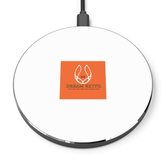 A white circular wireless charger with Dream Exito logo in orange square centered on top, black power cord