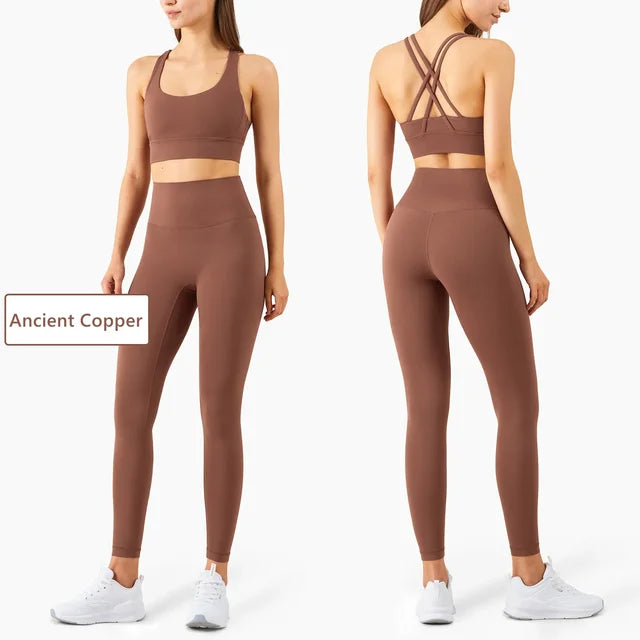 Ancient Copper athletic set with strappy back sports bra and high-waisted compression leggings