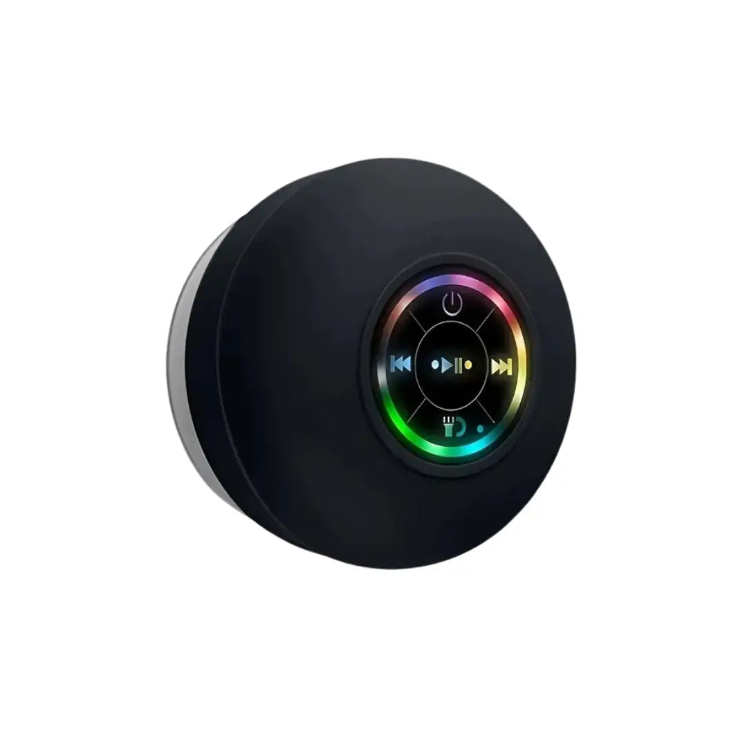 Angled view of black circular audio device with illuminated rainbow LED control ring.