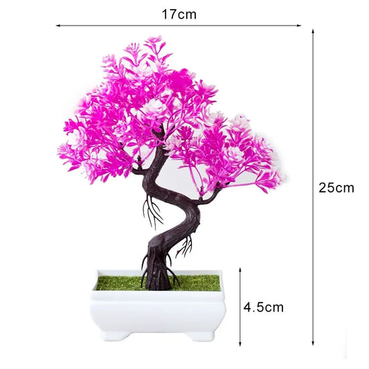 Artificial bonsai tree with bright pink and white foliage in a white pot