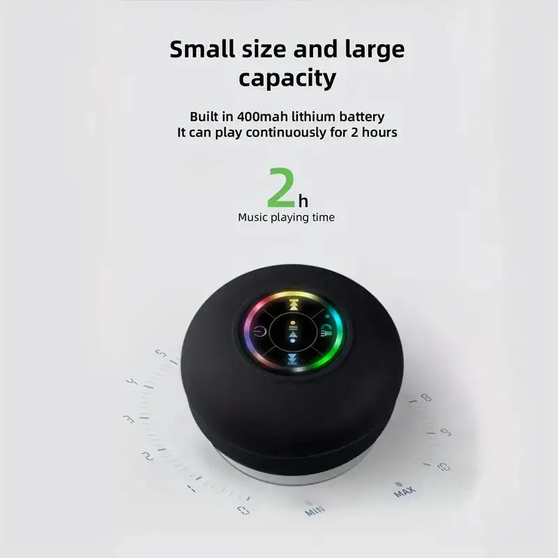 Black circular audio device with 400mAh battery capacity and 2-hour playback time