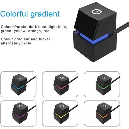 Black key switch with color-changing LED lights, showcasing a gradient effect.