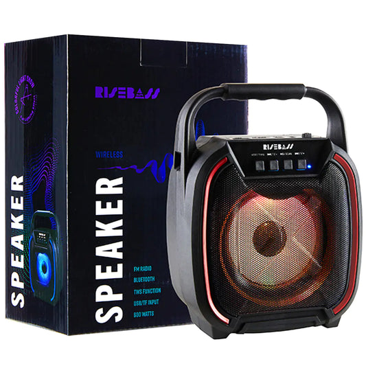 Black portable speaker with red accents and its packaging.