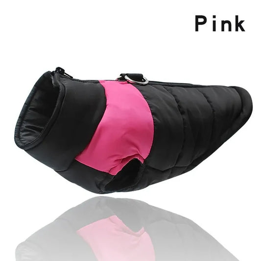 Black quilted dog vest with pink accent panel and reflective backing