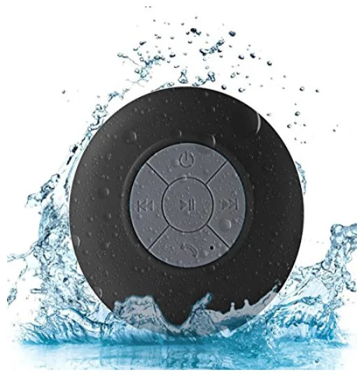 Black round waterproof speaker with control buttons, splashing in water.