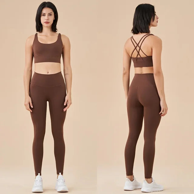 Brown athletic set with sports bra and leggings, shown from front and back with criss-cross straps