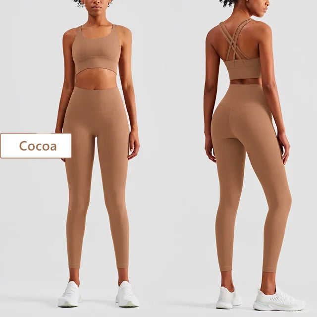 Cocoa-colored workout set on model with cross-back sports bra and high-waisted seamless leggings