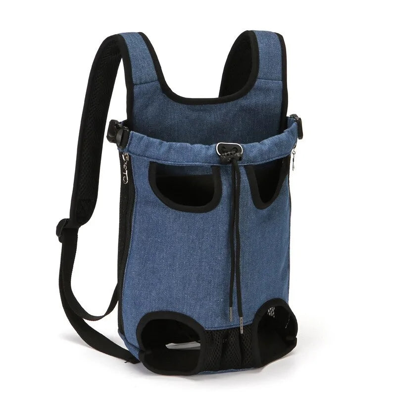 Denim blue pet carrier backpack with black trim, mesh ventilation, and adjustable straps for comfort