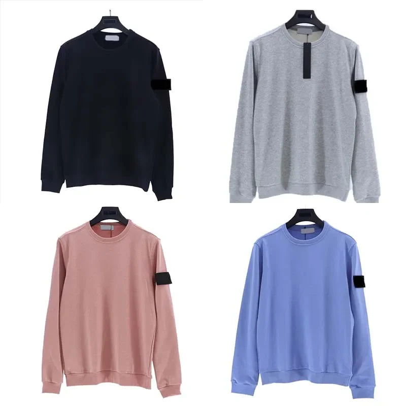 Grid of four sweatshirts in black, gray, pink, and blue colors, each with black arm patch and price tag