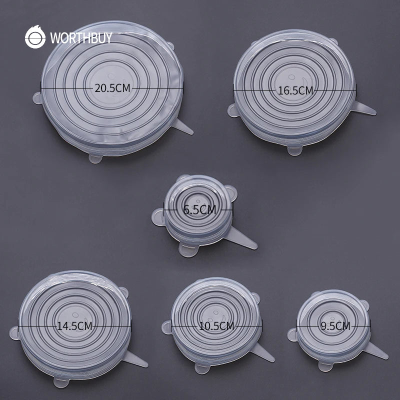 All six silicone stretch lid sizes from the set laid out together, smallest to largest