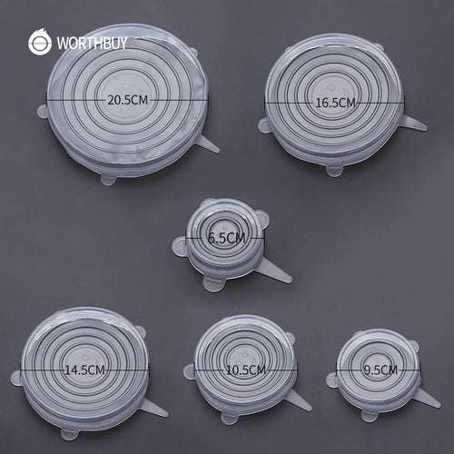 All six silicone stretch lid sizes from the set laid out together, smallest to largest
