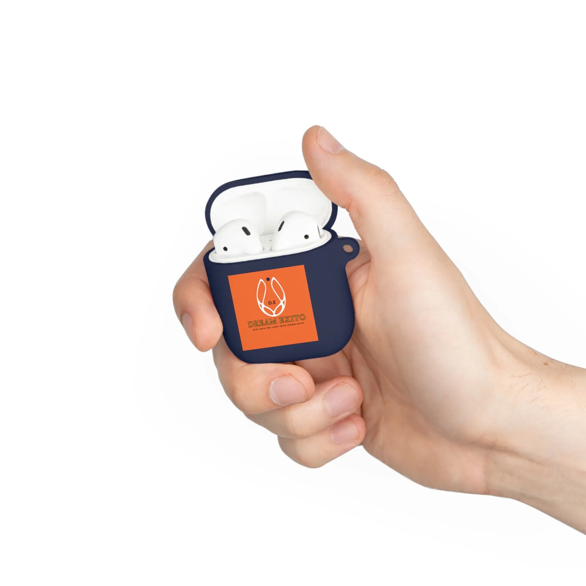 Hand holding a dark blue earbud case with an orange label