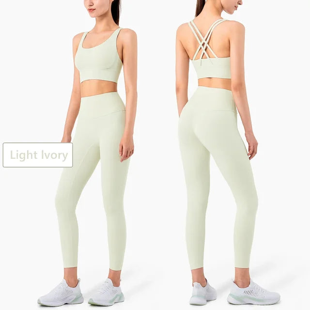 Light Ivory athletic set with strappy back detail and high-waisted seamless leggings in pale mint