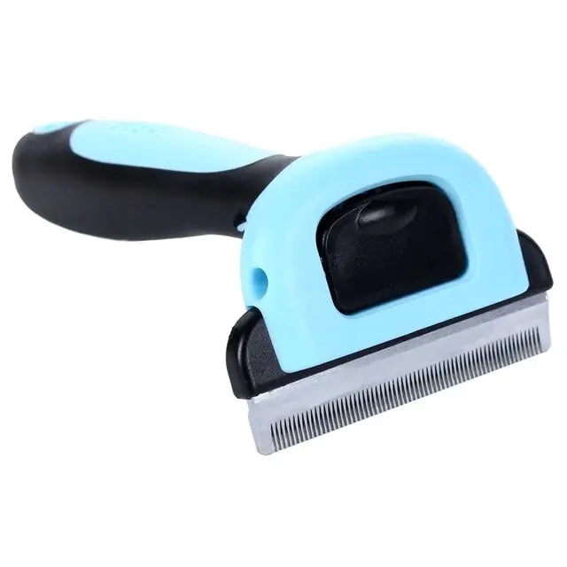 Light blue and black pet grooming tool with ergonomic handle and stainless steel deshedding blade on white surface