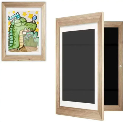 Light wood frame pair: left shows cute dinosaur drawing with stars, right shows black display surface