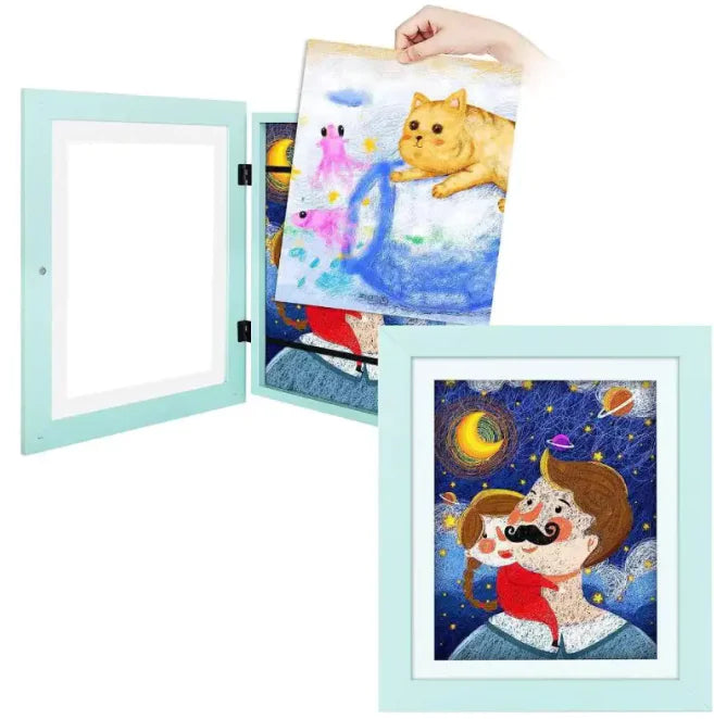 Mint green hinged frame showing whimsical artworks: cat illustration and space-themed character portrait
