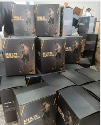 Multiple resistance band product boxes stacked in what appears to be a warehouse or shipping area.