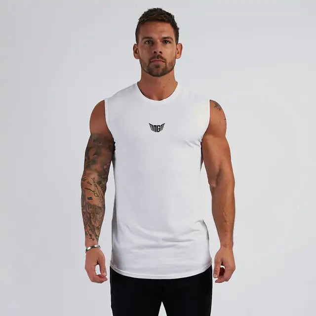 Muscular model in white sleeveless training shirt with black wing emblem, sleeve tattoo, white background