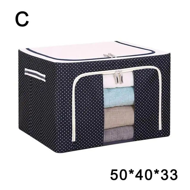 Navy polka dot storage box with transparent panel showing stacked blankets, size 50x40x33 listed, model C