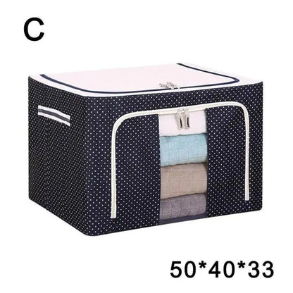 Navy polka dot storage box with transparent panel showing stacked blankets, size 50x40x33 listed, model C