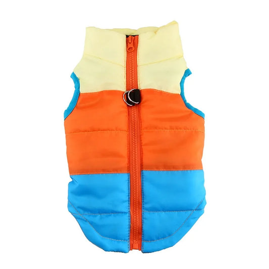 Padded pet vest in tricolor design with cream top, orange middle, and blue bottom, featuring front zipper