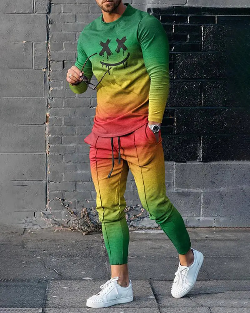 Person in rainbow gradient tracksuit from green to red with dark face design, wearing white studded sneakers