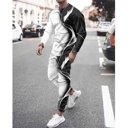 Person wearing split black and white tracksuit with curved dividing line design, matched with white sneakers