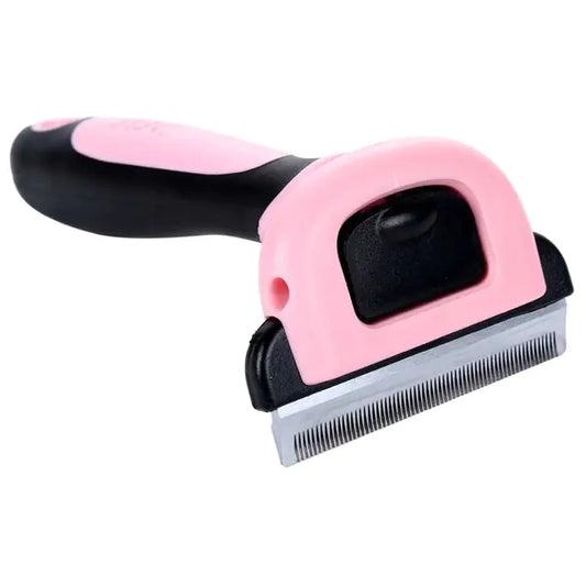 Pink and black pet grooming tool with ergonomic handle and stainless steel deshedding blade on white background