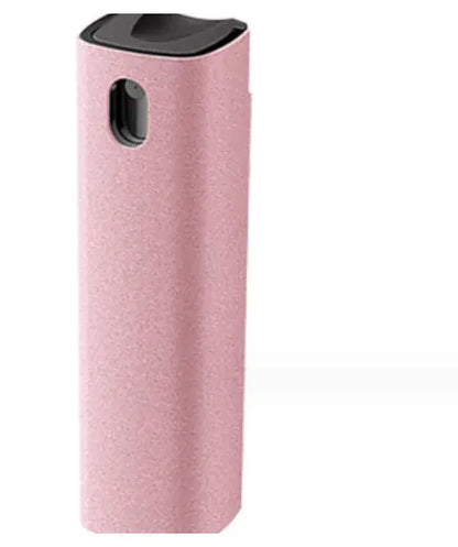 Pink spray bottle with black cap and nozzle.
