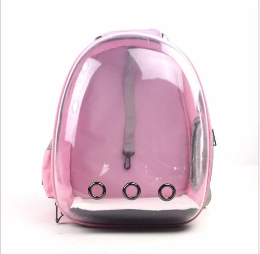 Pink transparent pet carrier backpack with three ventilation holes and white cushioned base for comfort