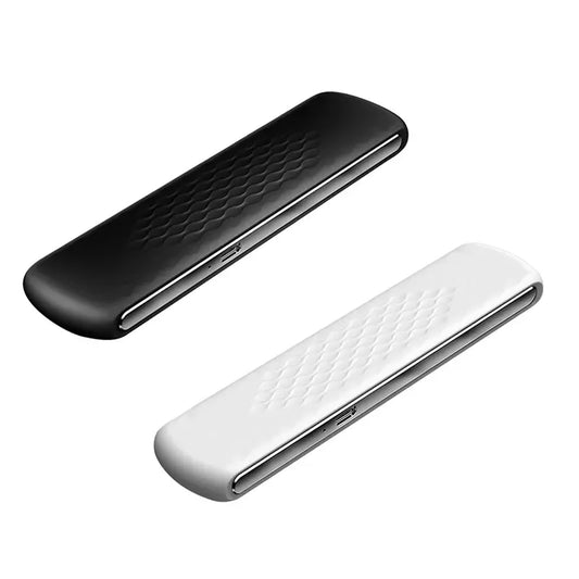 Product photo showing two slim noise generators in black and white colors, with a textured diamond pattern on their surfaces, viewed from an angle