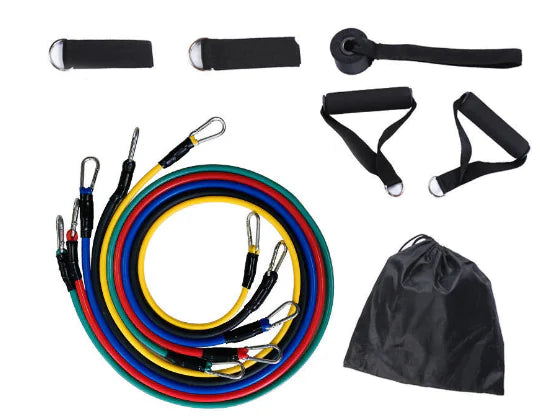 Resistance bands, handles, and accessories laid out on a floral-patterned background with a black carry bag.