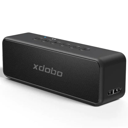 Side view of the black Xdobo speaker showing audio ports and the textured mesh grille design.