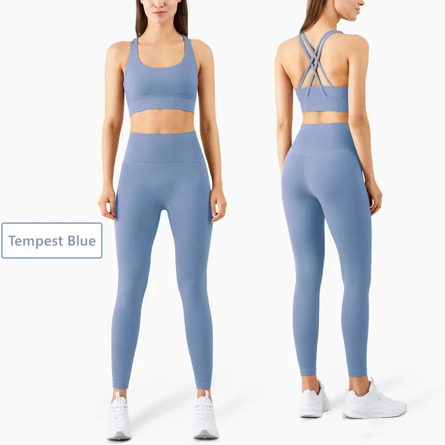 Tempest Blue workout set with sports bra and high-waisted leggings, shown from front and back