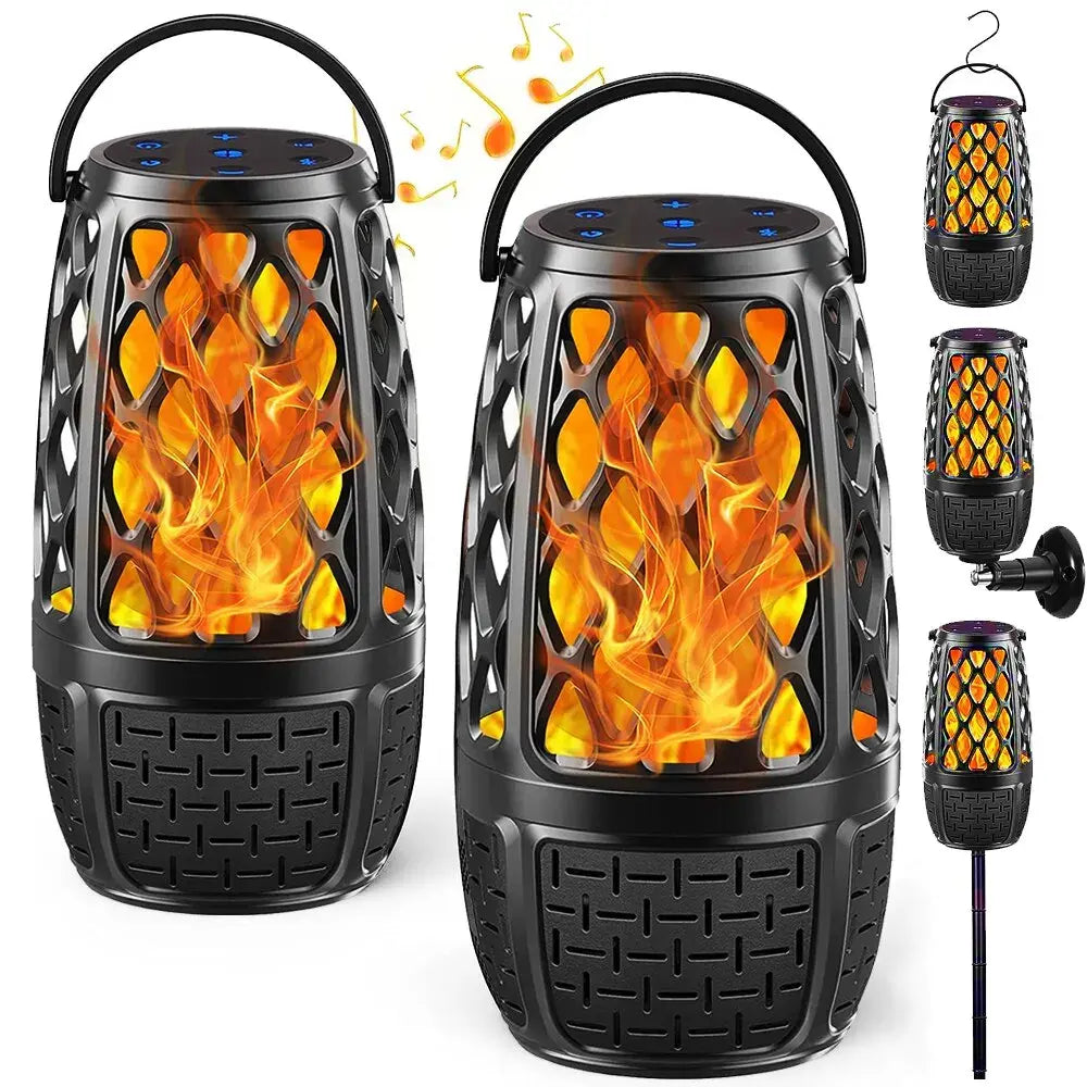 Two black lantern-shaped Bluetooth speakers with flame effects and control buttons on top, shown with various mounting options.