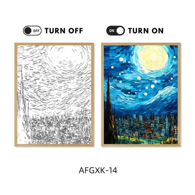 Two framed art pieces showing a village scene, one in black and white, the other in vibrant colors
