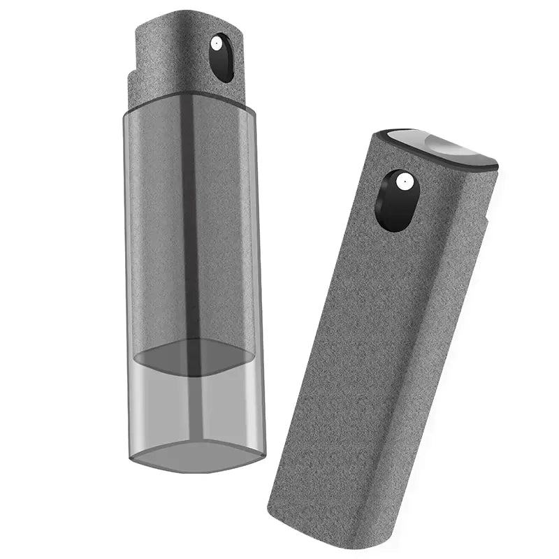 Two gray spray bottles with textured surfaces and black nozzles.