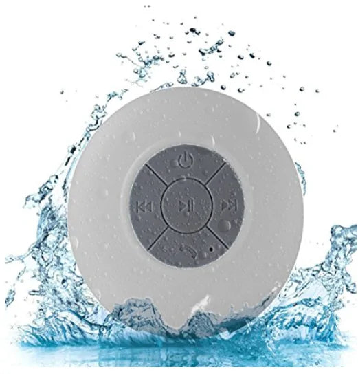 White round waterproof Bluetooth speaker with a central control panel and water splashing around it.