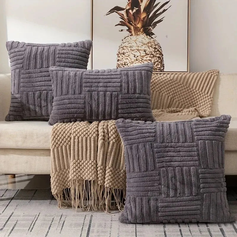 Gray boho faux fur throw pillow covers displayed on sofa
