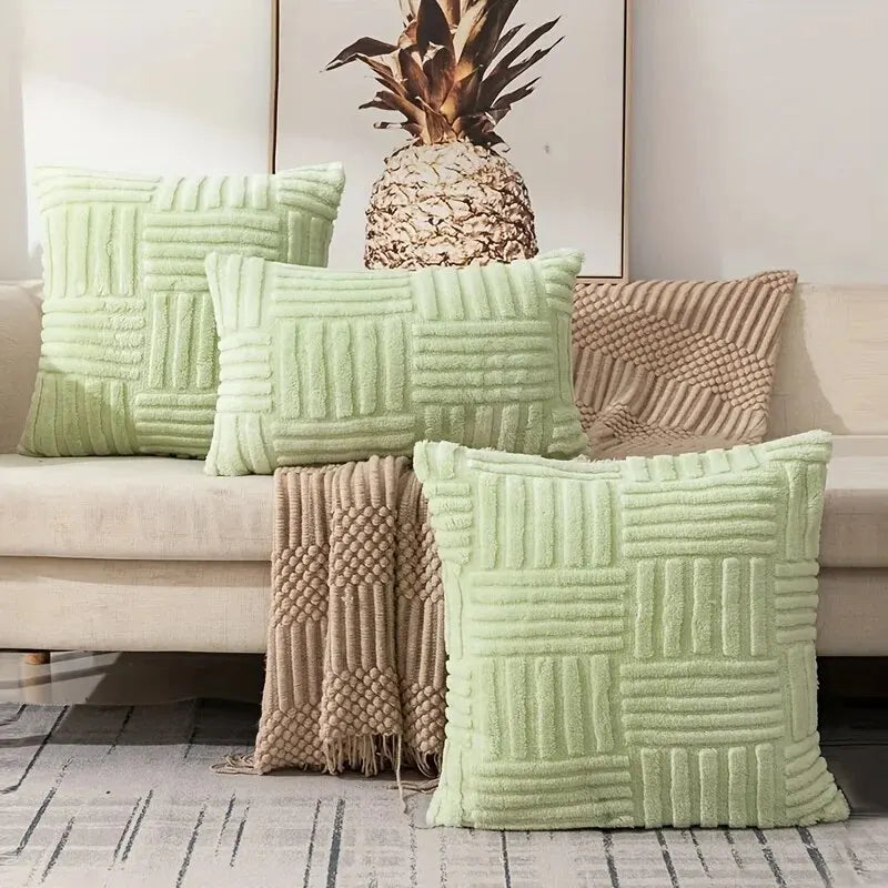 Green Pink boho faux fur throw pillow covers arranged on sofa